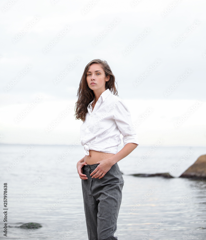 Beautiful caucasian girl have fun on the sea beach at the vacation Beautiful caucasian girl have fun on the sea beach at the vacation