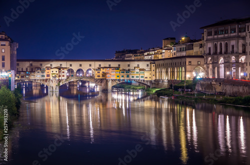 Ponte Vecchio in Florence by Arno river at night, Florence, Firenze, Italy © Bogusz