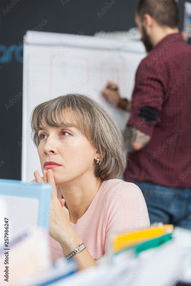 Portrait of pensive mature woman in the office Portrait of pensive mature woman in the office