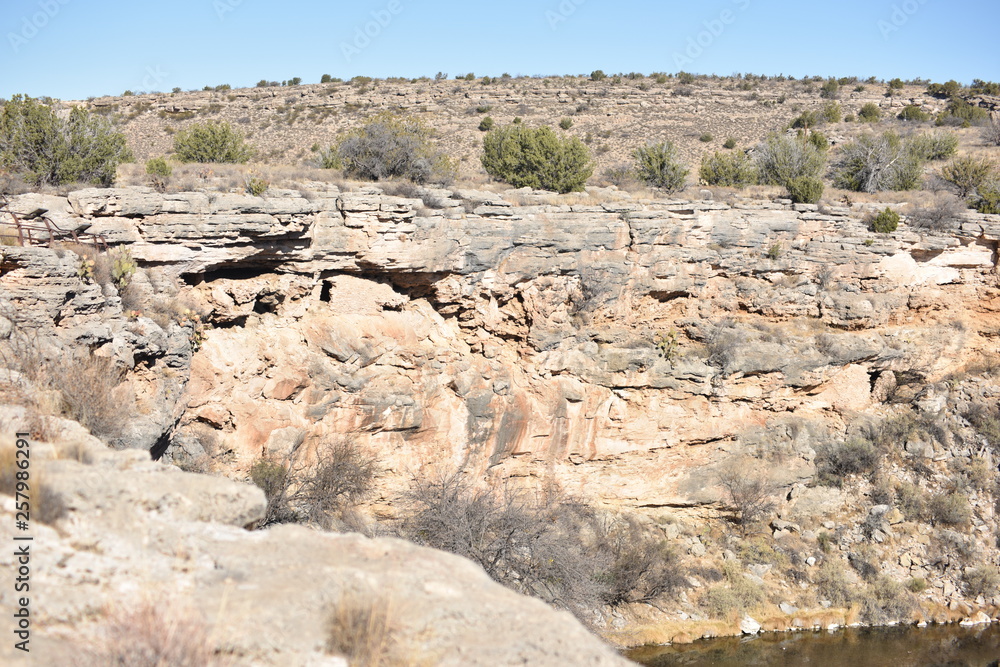 Fototapeta premium Montezuma Well. Part of Montezuma Castle National Monument. Rim Rock, AZ., U.S.A. Jan. 13, 2018. A natural limestone sinkhole 386-feet in diameter producing 1.5-mil US gallons of water each day.