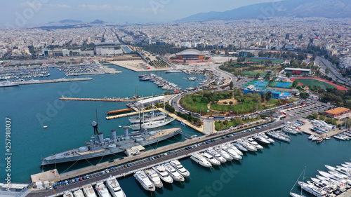 Aerial drone bird's eye view of small port and Park of Maritime Tradition where historic Averof warship is docked, Flisvos, Faliro Marina, Athens riviera, Attica, Greece