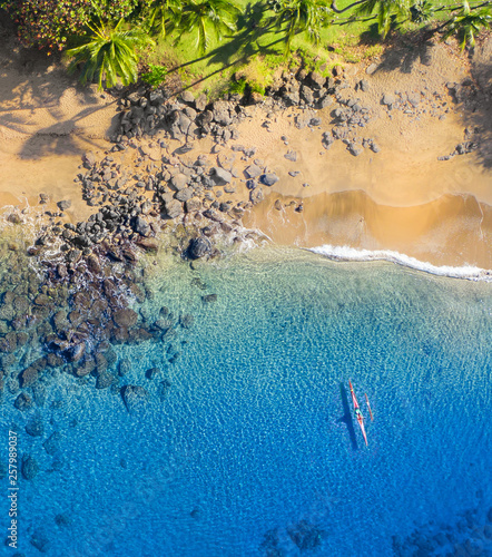 Kayaking in the blue ocean photo