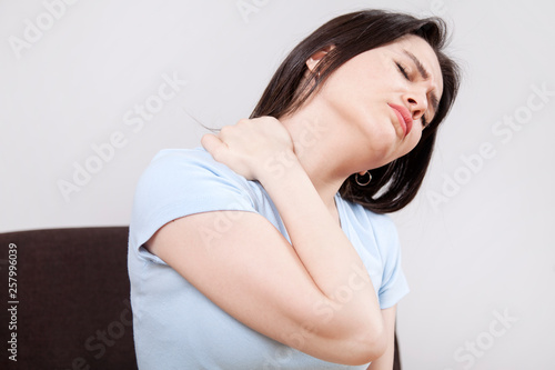 Young woman with neck pain