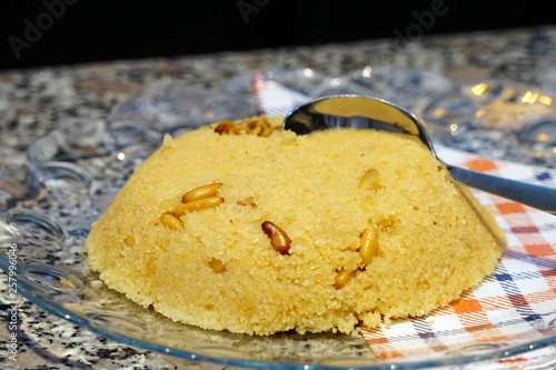 Homemade prepared semolina helva dessert close up view photo