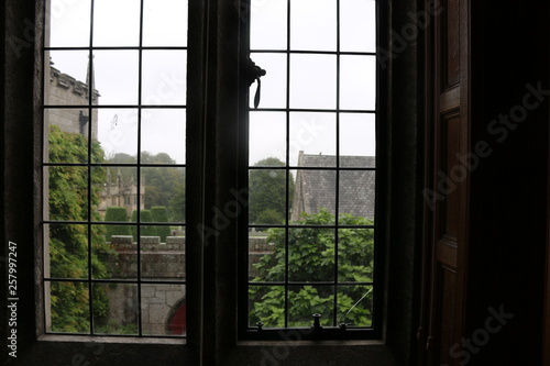 Tudor leaded window shot from inside an English manor house. A leaded window of  an English Tudor manor house taken from inside.