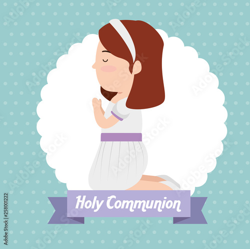 girl with hairstyle and dress to first communion