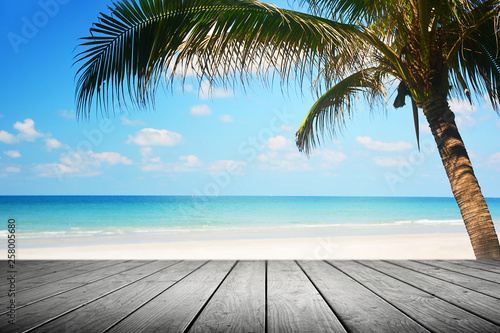 Fototapeta Naklejka Na Ścianę i Meble -  Tropical beach background with palm tree and empty wooden, Summer.
