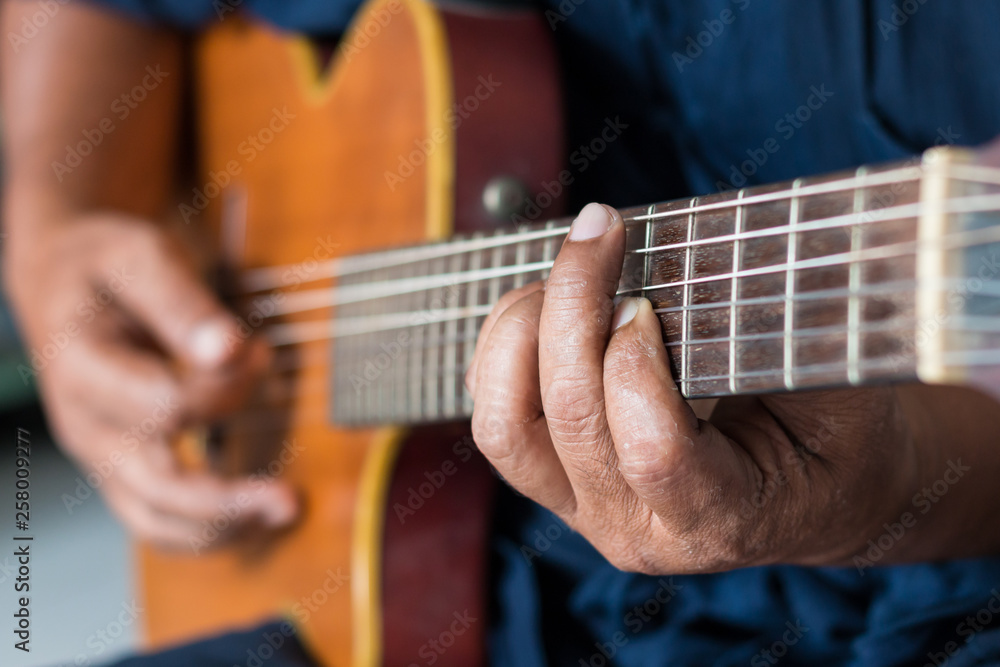 Men playing guitar