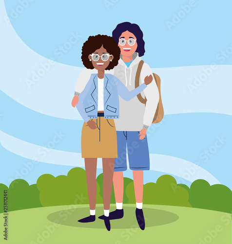 university woman and man couple with bushes