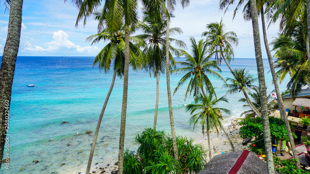 Naklejka premium Sabang Island , Acheh , Indonesia - October 6th, 2017. Freddies Santai Sumurtiga is a beach resort that is very popular for tourist to stay in the island.
