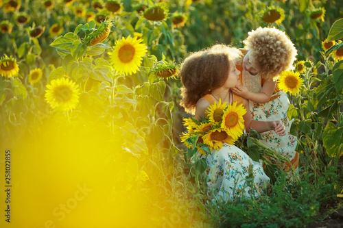 Children in sunflowers