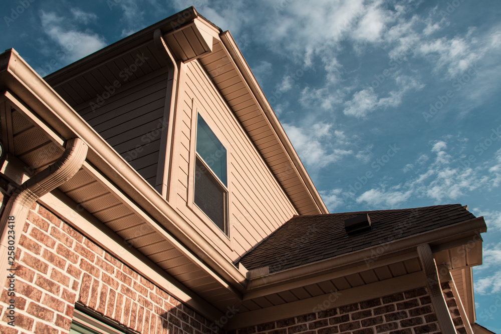 Suburban family house catches bright sunlight and displays its modern design and great craftsmanship on all aspects of the building. Suburban family house catches bright sunlight and displays its modern design and great craftsmanship on all aspects of the building.