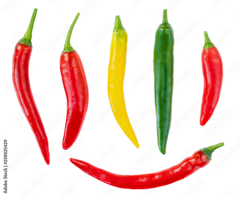 Collection of Chili peppers isolated on a white background. Top view. Food ingredient. Red, Yellow, Green pepper
