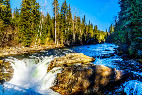 Water of the Murtle River tumbles over the edge of Mushbowl Falls in the Cariboo Mountains of Wells Grey Provincial Park  British Columbia  Canada 