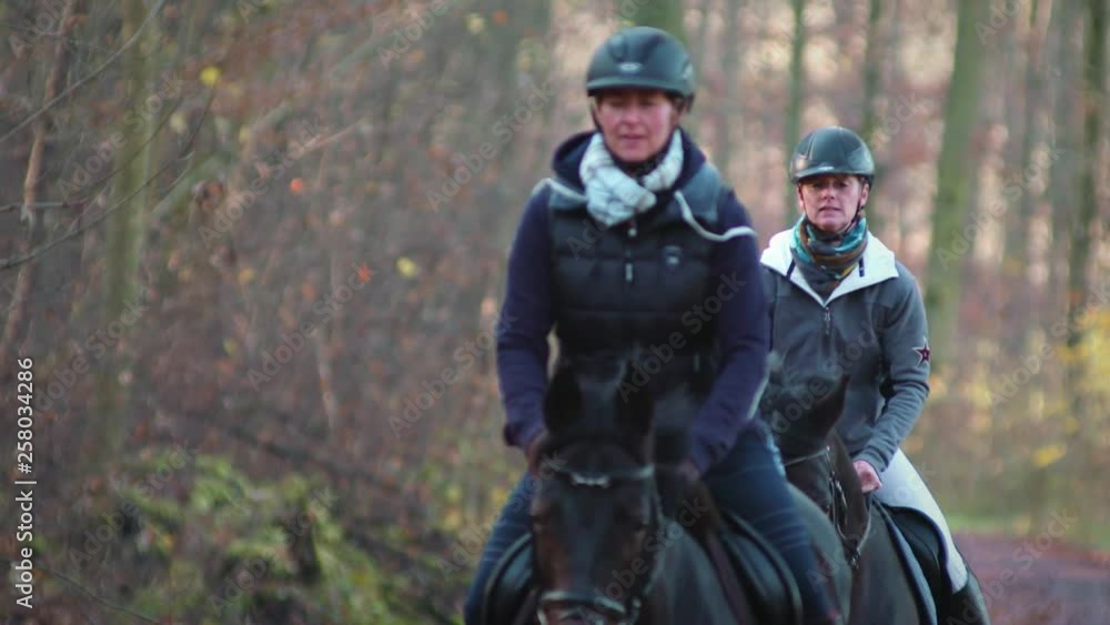 2 Girls Riding Automn Forest Slow Motion 2 Girls Riding Automn Forest Slow Motion