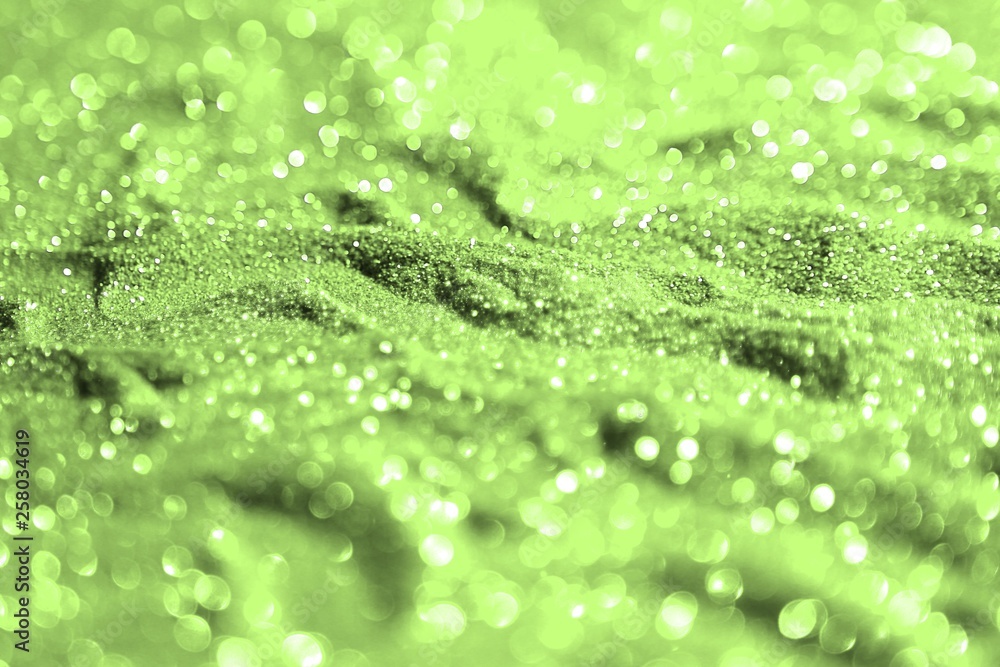 green glossy copper sand made of glitters - colorful concept with bokeh texture - wonderful abstract photo background green glossy copper sand made of glitters - colorful concept with bokeh texture - wonderful abstract photo background