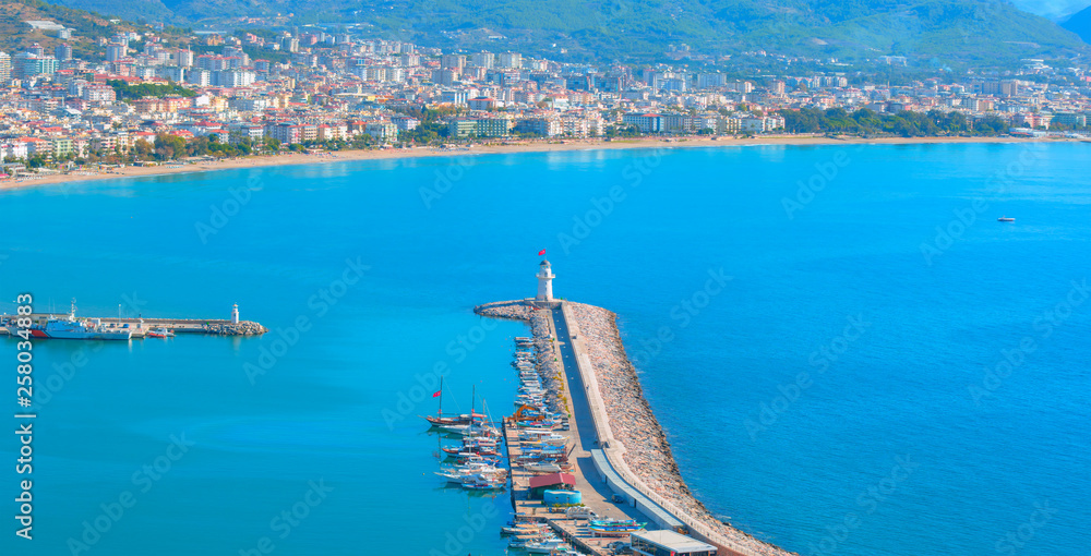 Panoromic view of Alanya peninsula - Ancient shipyard near Red Tower (Kizil Kule) in - Antalya, Turkey