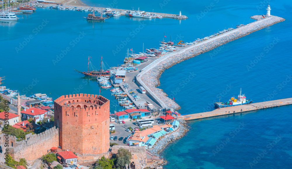 Panoromic view of Alanya peninsula - Ancient shipyard near Red Tower (Kizil Kule) in - Antalya, Turkey