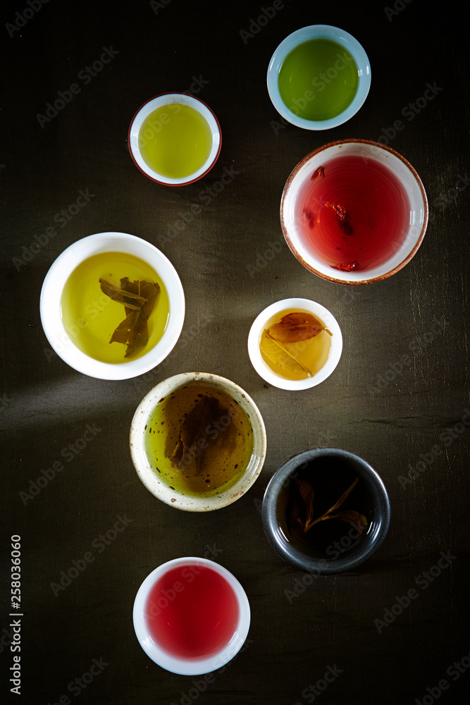 Various cups of tea background