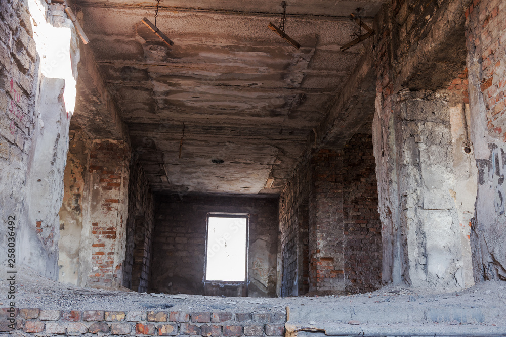 Mystical interior, ruins of an abandoned ruined building of house of culture, theater of USSR. Old destroyed walls, corridor with garbage and dirt. Destroyed molding, plaster ornaments, bas-relief Mystical interior, ruins of an abandoned ruined building of house of culture, theater of USSR. Old destroyed walls, corridor with garbage and dirt. Destroyed molding, plaster ornaments, bas-relief