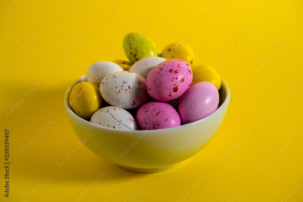 Colorful Ester eggs in a cup Colorful Ester eggs in a cup