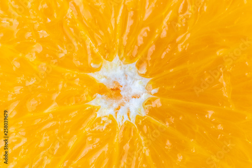 Bright juicy citrus pulp close-up. High-quality image is suitable for topics: healthy lifestyle, vitamins, proper nutrition, diet, summer, fresh juices. Background fruit texture.