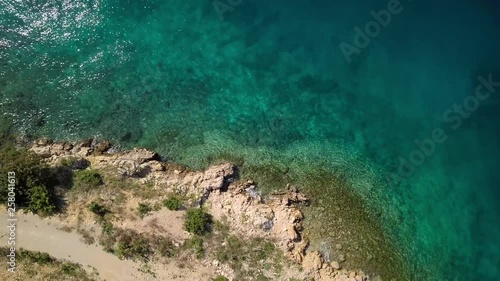 Aerial view of crystal clear water off the coastline inisland Krk, Croatia photo