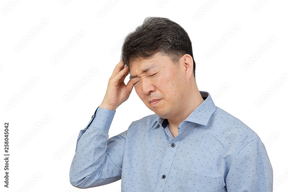 A middle-aged man suffering from headache on white background. A middle-aged man suffering from headache on white background.