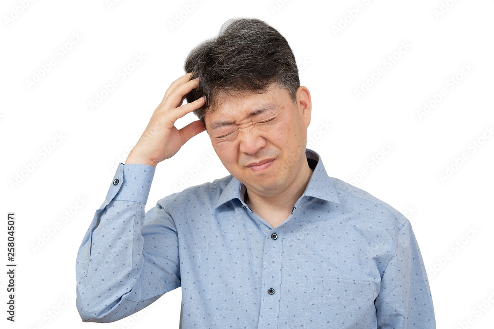 A middle-aged man suffering from headache on white background. A middle-aged man suffering from headache on white background.