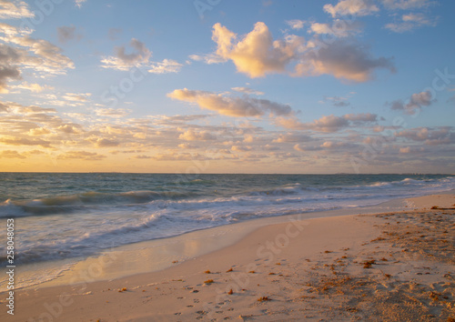 Beautiful sunrise on white beach, cancun Quintana Roo, Mexico