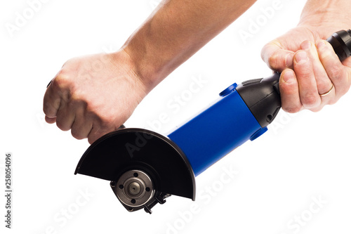 Angle grinder in mans hansds isolated on a white background