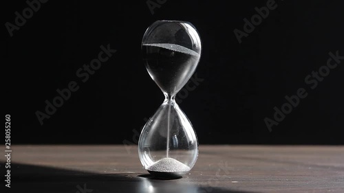 Hourglass on dark background