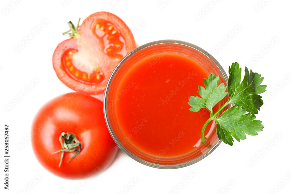 glass of fresh tomato juice and natural organic tomato with parsley glass of fresh tomato juice and natural organic tomato with parsley