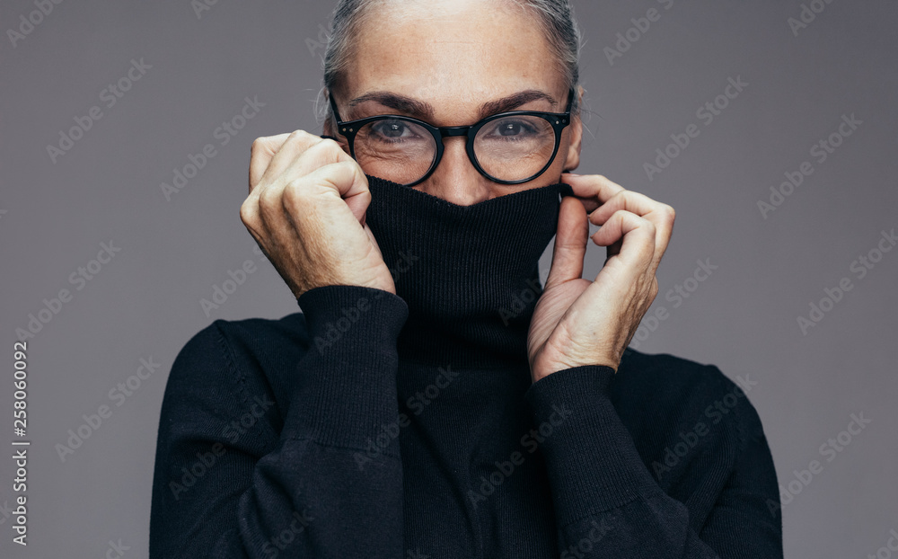 Senior woman feeling cold Senior woman feeling cold