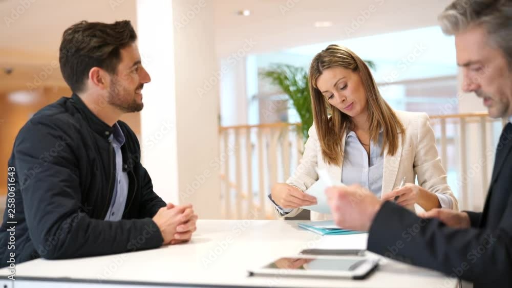 Business interview with manager and human resources in contemporary office Business interview with manager and human resources in contemporary office