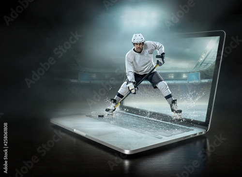 Canvas Print Caucassian ice hockey Players in dynamic action in a professiona