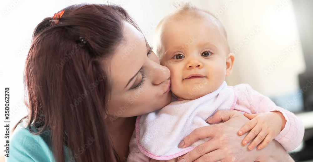 Portrait of mother with her cute baby girl Portrait of mother with her cute baby girl