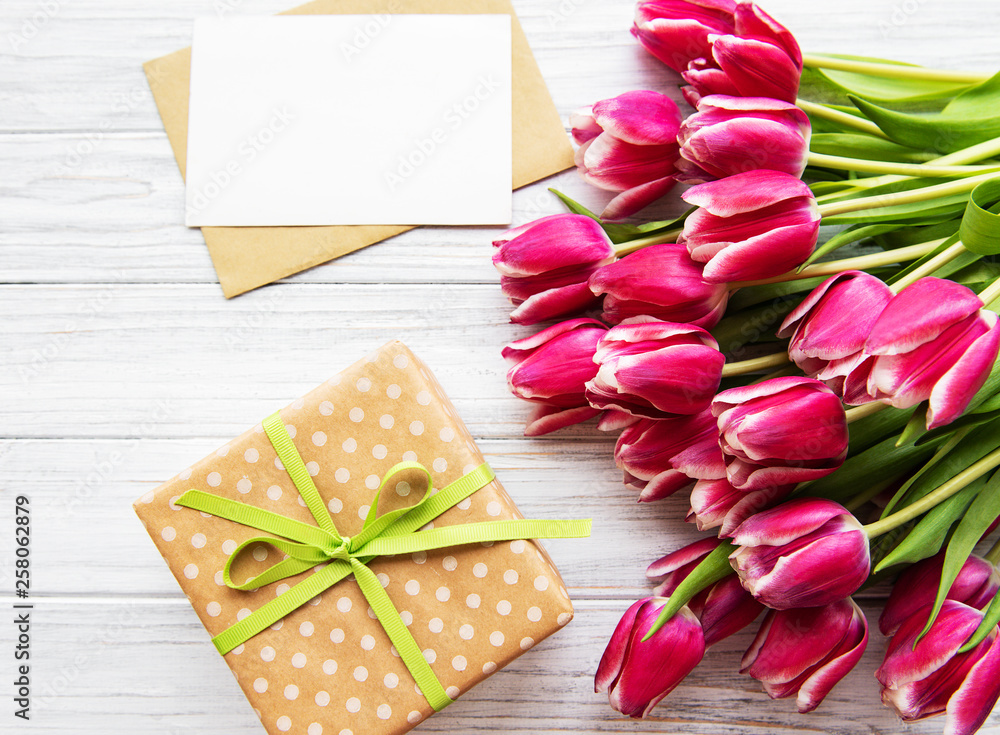 Gift box and tulips bouquet Gift box and tulips bouquet