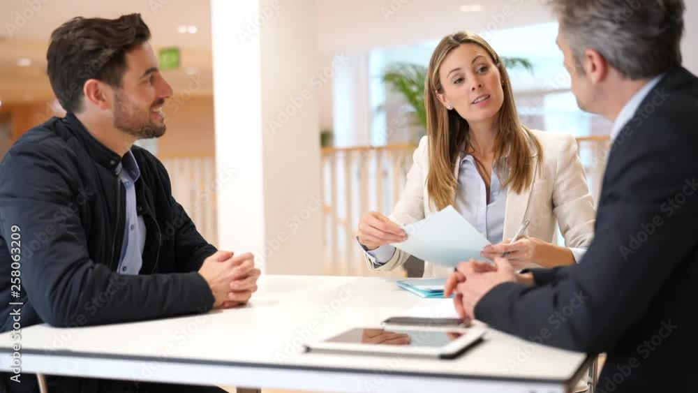 Business interview with manager and human resources in contemporary office Business interview with manager and human resources in contemporary office