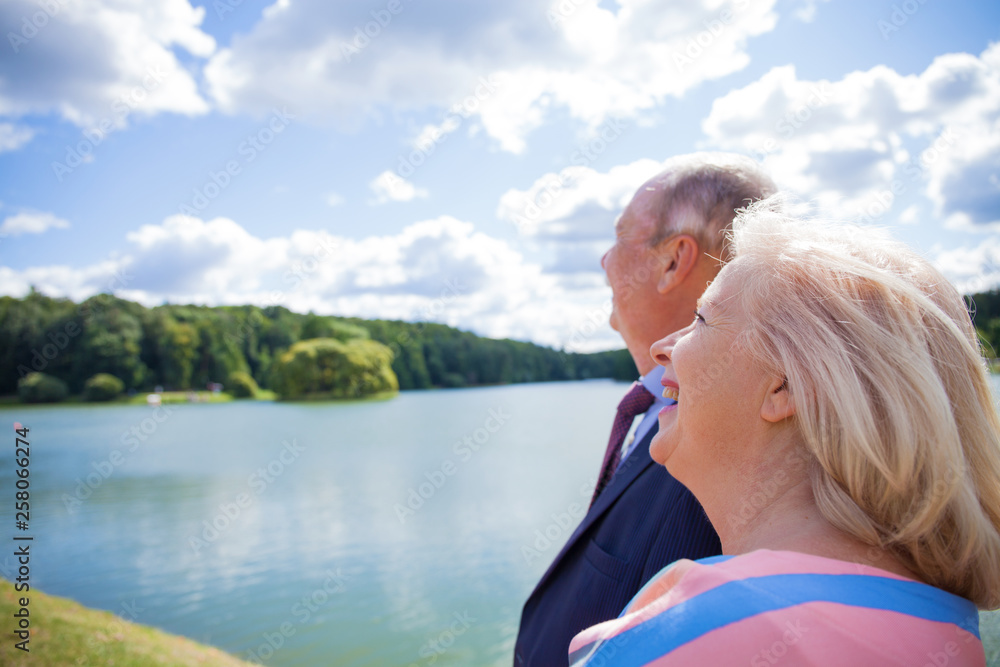 Elderly couple on a walk in a country park