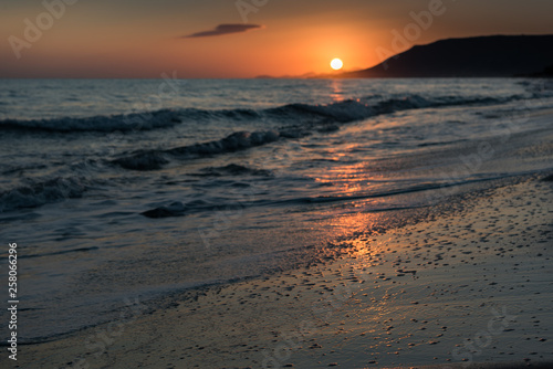 Fototapeta Naklejka Na Ścianę i Meble -  Orange sunrise over sea