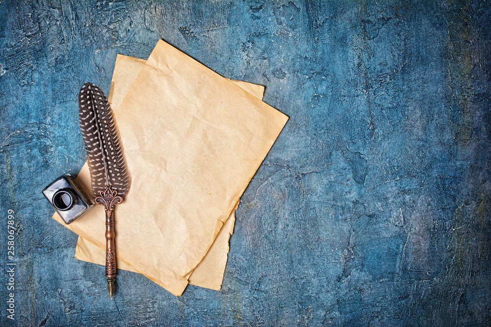 Mock up of empty vintage paper sheets with quill pen and bottle of