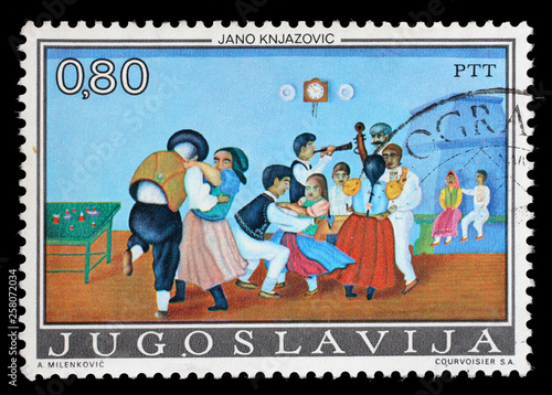 Stamp issued in Yugoslavia shows Naive Art "Children's Dance", by Jano Knjazovic, circa 1974.