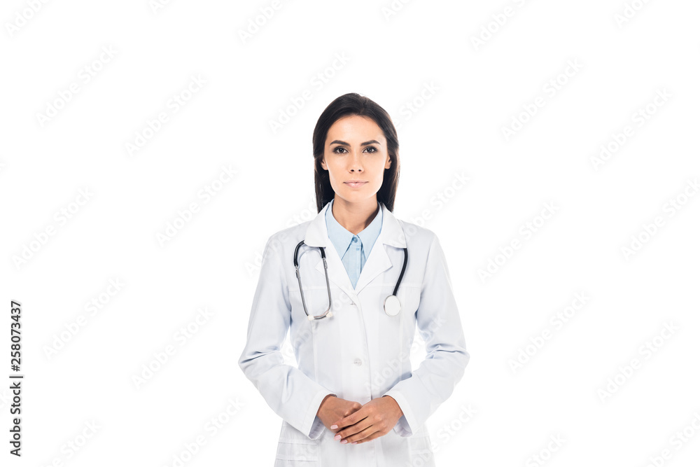 Front view of attractive doctor with stethoscope isolated on white Front view of attractive doctor with stethoscope isolated on white