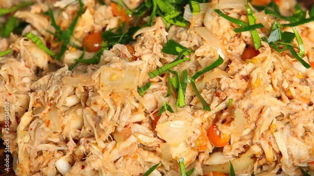 Frying minced young jackfruit with pork and tomato in pan , Thai northern food Frying minced young jackfruit with pork and tomato in pan , Thai northern food