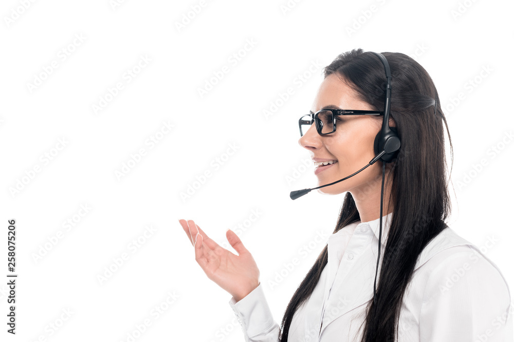 Smiling call center operator in glasses talking on microphone isolated on white Smiling call center operator in glasses talking on microphone isolated on white