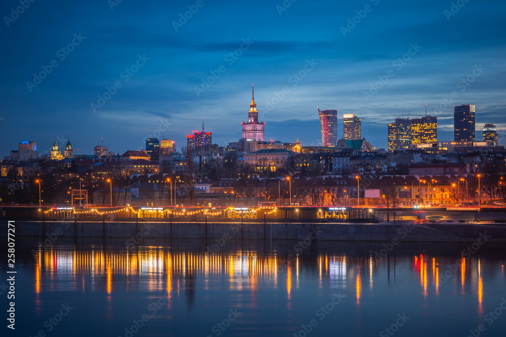 Panorama of skyscrapers in the center of Warsaw at night, Poland