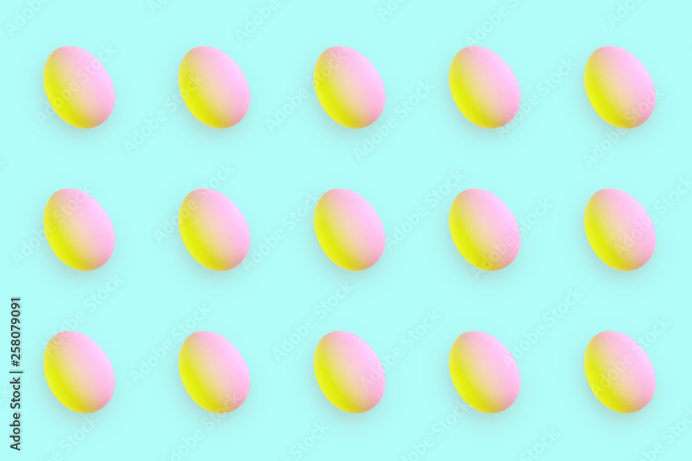 Pattern made of Easter eggs in duotone colors on turquoise background. Minimal styled concept.