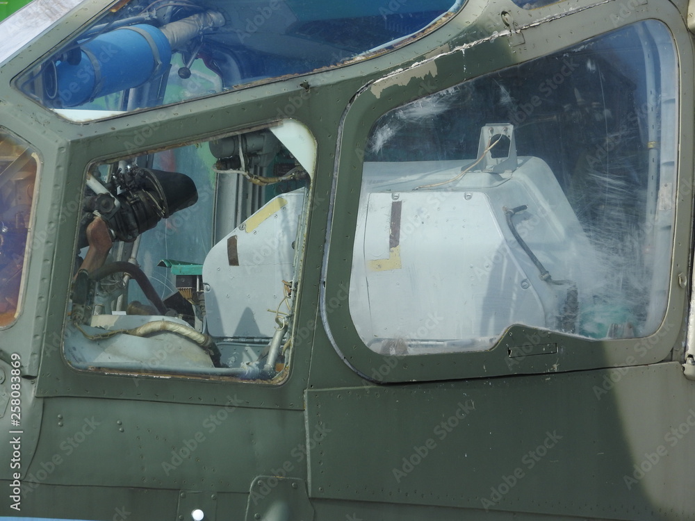 Military helicopter, propellers, installations and units for shooting, close-up.