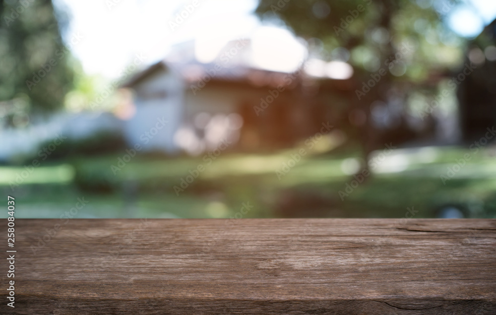 Empty dark wooden table in front of abstract blurred bokeh background of restaurant . can be used for display or montage your products.Mock up for space. Empty dark wooden table in front of abstract blurred bokeh background of restaurant . can be used for display or montage your products.Mock up for space.